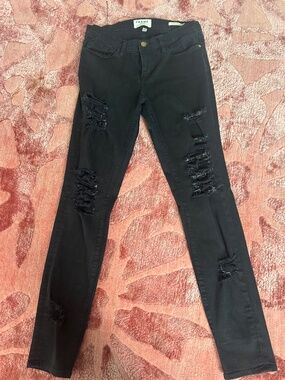 Distressed FRAME black skinny jeans size 28
